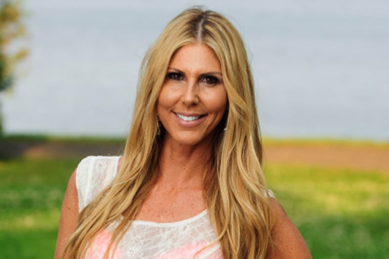 Lisa Moreno Dickinson poses for Sexy Singles at Glen Foerd in Philadelphia, Pa. on Wednesday, June 10, 2015.