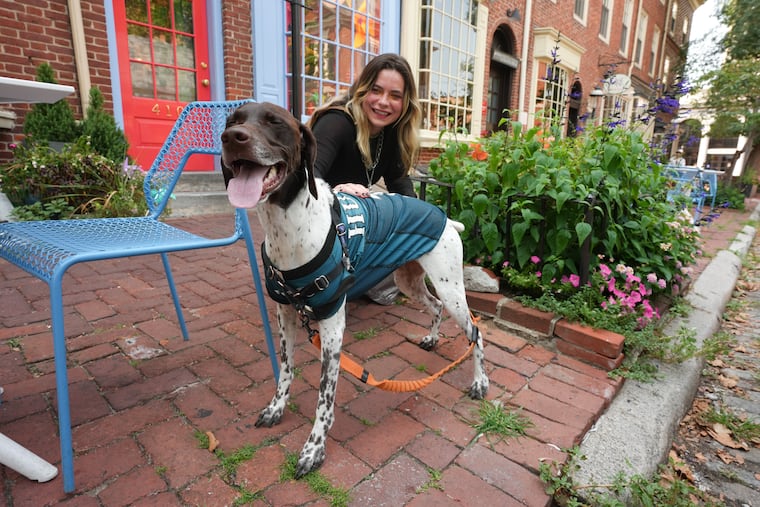 Tanner likes to share food with Barrett, her 6-year -old German Shorthaired Pointer. His favorites include banh mi from Ba Le and pizza from Pizzeria Beddia.