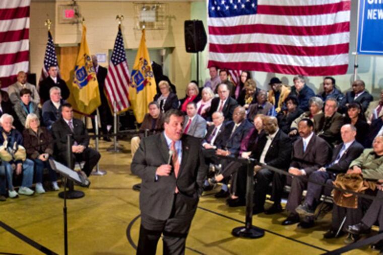 Gov. Christie told a town-hall-style gathering at the Chesilhurst Community Center that he supported Camden Mayor Dana L. Redd following last week's layoffs of police, firefighters, and other city workers. (David M Warren / Staff Photographer)