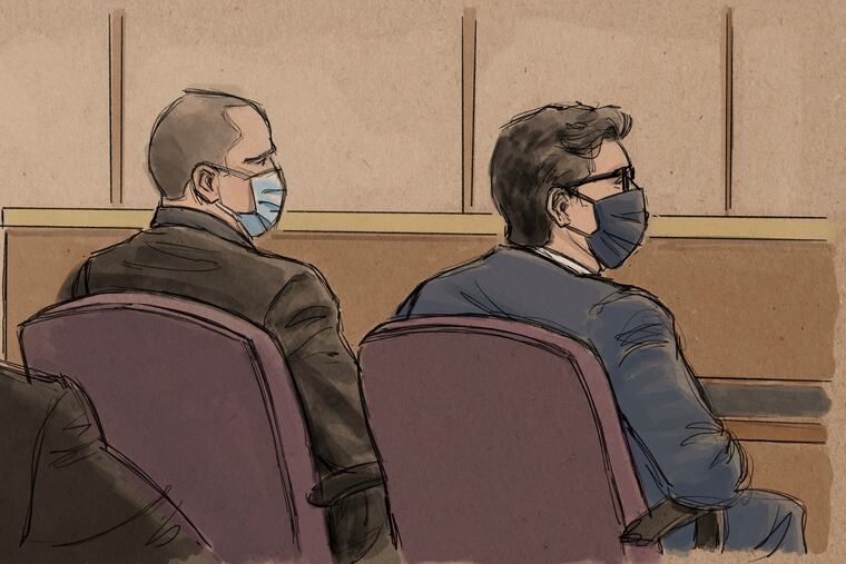 In this courtroom sketch, former Minneapolis police officer Derek Chauvin, center, sits beside his defense attorney during a hearing in Minneapolis on Sept. 11.