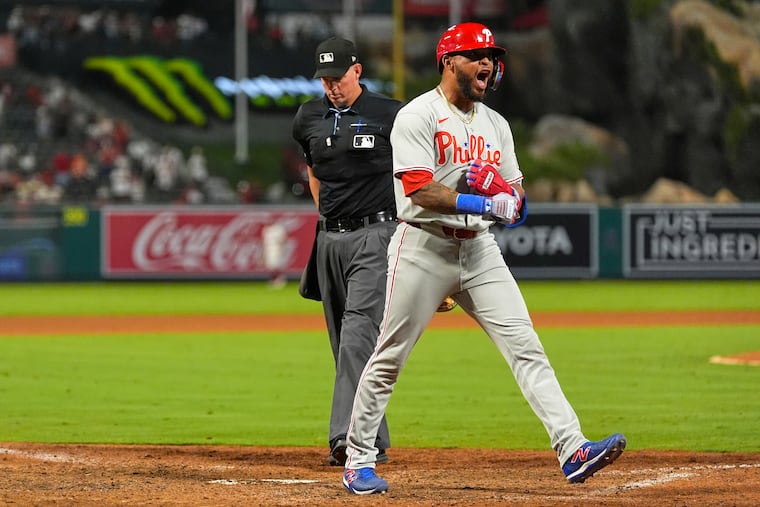 Edmundo Sosa celebrates after his pinch-hit grand slam won it for the Phillies in the ninth inning Friday.