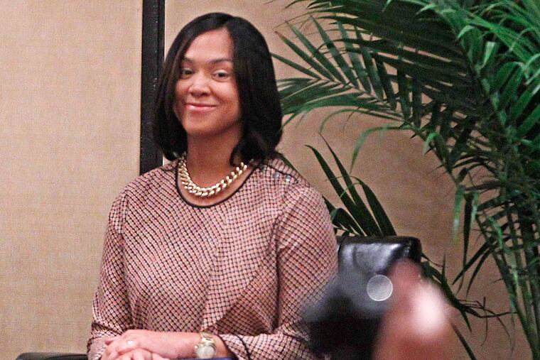 Baltimore State's Attorney Marilyn Mosby smiles before addressing the Women in NAACP brunch yesterday at the convention center. MICHAEL BRYANT / STAFF PHOTOGRAPHER