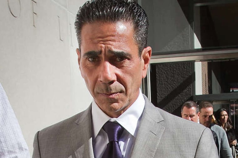 Joseph Merlino, dapper as always, leaves the federal courthouse for lunch.