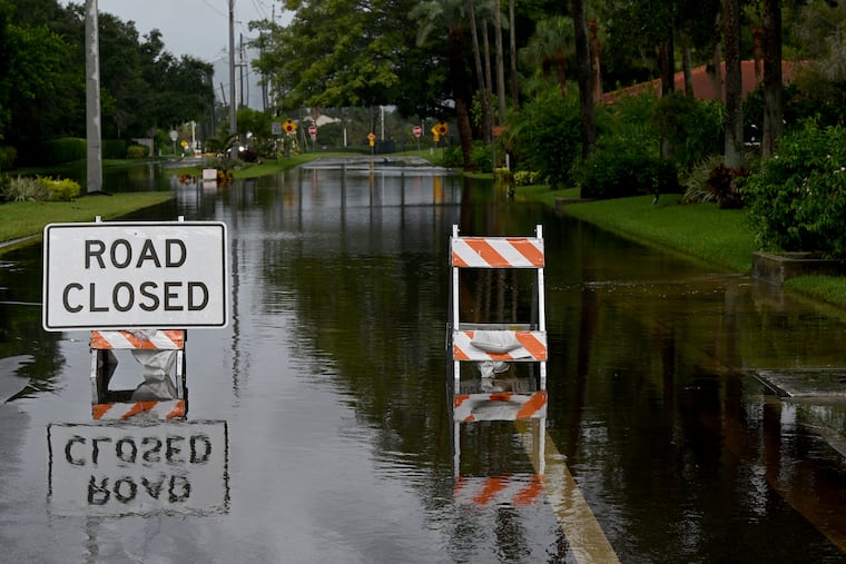 A flooded is closed after Tropical Storm Debby swept through Florida on Monday. We may see those signs around here this week.