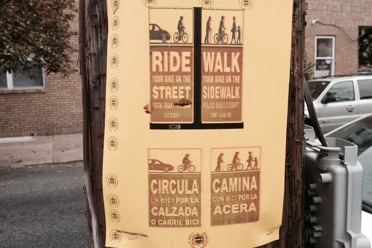 Unauthorized signs have blossomed in Queen Village and Bella Vista requesting bicyclists obey the law. DON GROFF / FOR THE DAILY NEWS