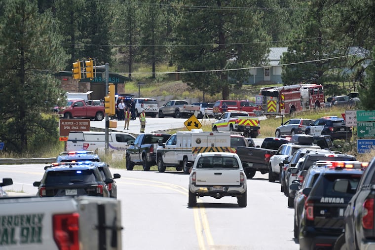 Law enforcement and emergency personnel respond to a shooting at Evergreen High School on Wednesday, Sept. 10, 2025, in Evergreen, Colo.