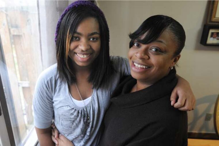 At their Marlton home, Nicole Bailey and daughter Nala Bailey, 14, on Feb. 6, 2013. ( APRIL SAUL / Staff Photographer )