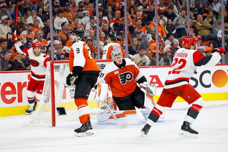 Flyers goaltender Dan Vladar and Flyers defenseman Jamie Drysdale react to Hurricanes right wing Jackson Blake's second-period goal.