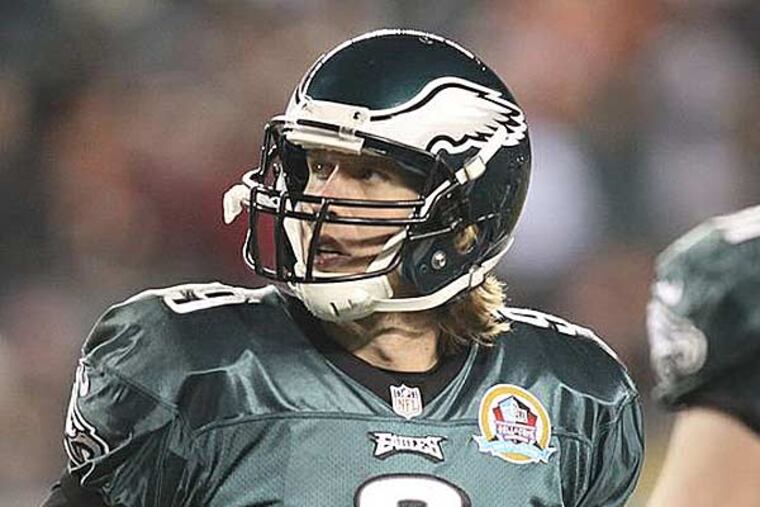 Nick Foles looks back after a fumble picked up by the Bengals and run for a touchdown during the third quarter. (Steven M. Falk/Staff Photographer)