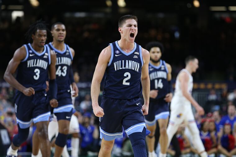 Villanova's Collin Gillespie celebrates after hitting a three-pointer against Kansas during the first half of their Final Four game April 2 in New Orleans.