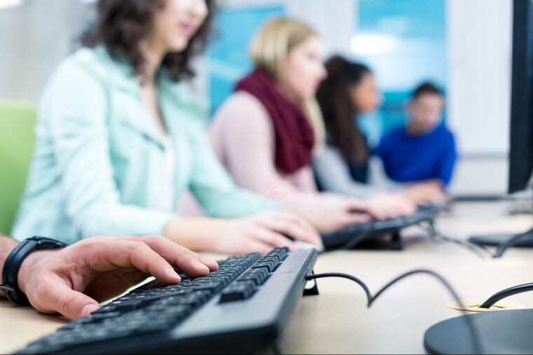 A computer room full of IT students