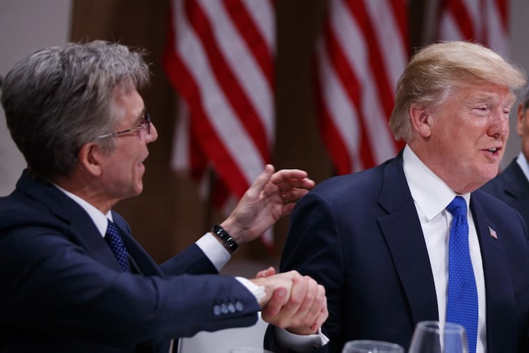 SAP CEO Bill McDermott, with President Trump at the World Economic Forum, Thursday, Jan. 25, 2018, in Davos, Switzerland. McDermott has grown SAP through a string of mergers over the past decade.