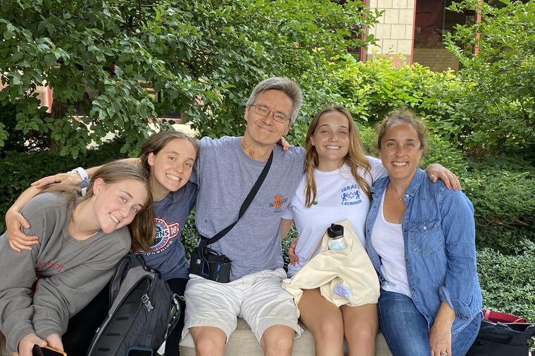 Kevin Volpp, who studies heart disease and health policy at Penn Medicine, survived a sudden cardiac arrest thanks to prompt CPR. Daughters Daphne (left), Anna, and Thea, and wife Marjorie (right) were with him in July upon his discharge from a Cincinnati hospital.