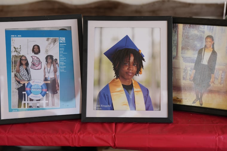 Photos of Imani Ringgold on a table at her grandmother’s house. Ringgold, 20, was shot to death in West Philadelphia in April.