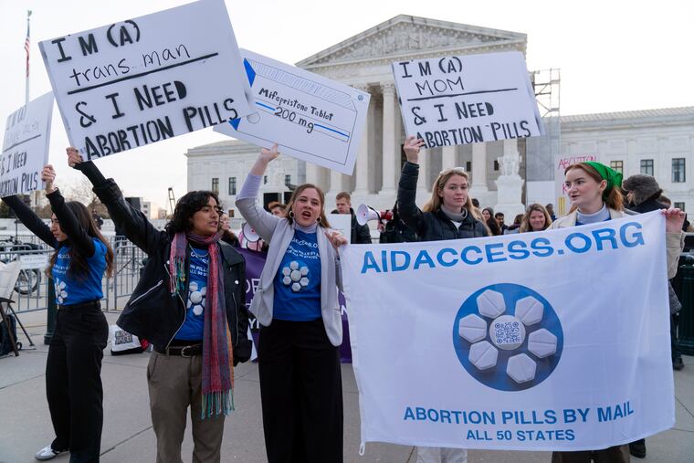 Abortion-rights activists rally outside of the Supreme Court on Tuesday in Washington.