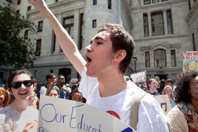Masterman sophomore Ensar Tota joins hundreds of student protesters outside City Hall. (ED HILLE / STAFF PHOTOGRAPHER )
