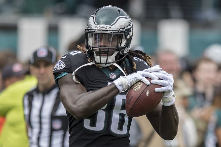 New Eagles running Jay Ajayi gets catches a pass during warmups before playing the Broncos.