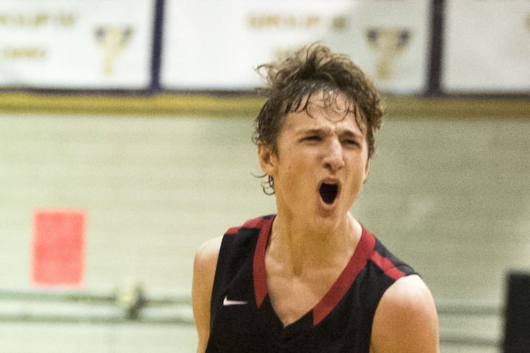 Mike DePersia of Haddonfield celebrating after making a shot three-quarters of the length of the court at the end of the third quarter in the South Jersey Group 2 final on March 7, 2017.