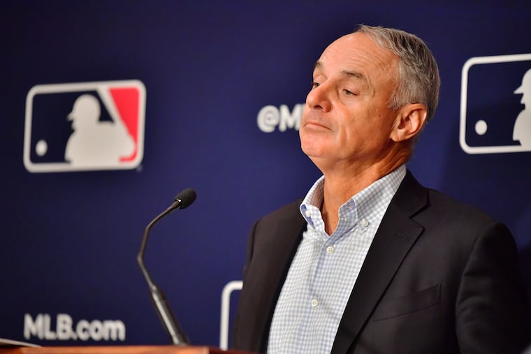In this photo from February 10, 2022, Major League Baseball Commissioner Rob Manfred answers questions during an MLB owner's meeting at the Waldorf Astoria in Orlando, Florida. (Julio Aguilar/Getty Images/TNS)