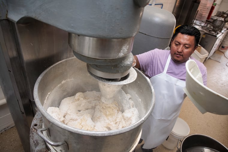 Juan Cutz works on a batch of donuts at Del Buono’s Pastry Shop on Tuesday, Aug. 25, 2026 in Haddon Township.