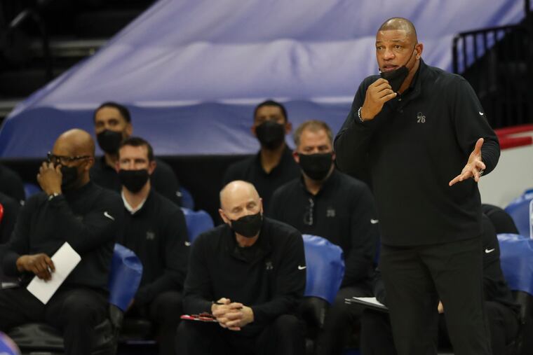 Sixers head coach Doc Rivers, right, on the sideline during Friday's win over the Bulls.