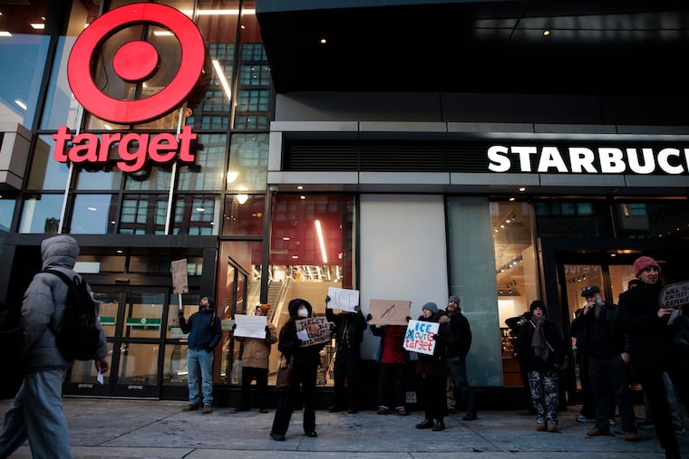 Demonstrators gathered outside of the Target store at Broad and Washington Streets on Tuesday.