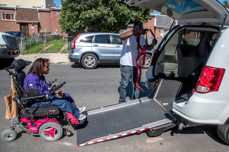 Theresa Yates prepares to board an Uber for a ride to the grocery store.