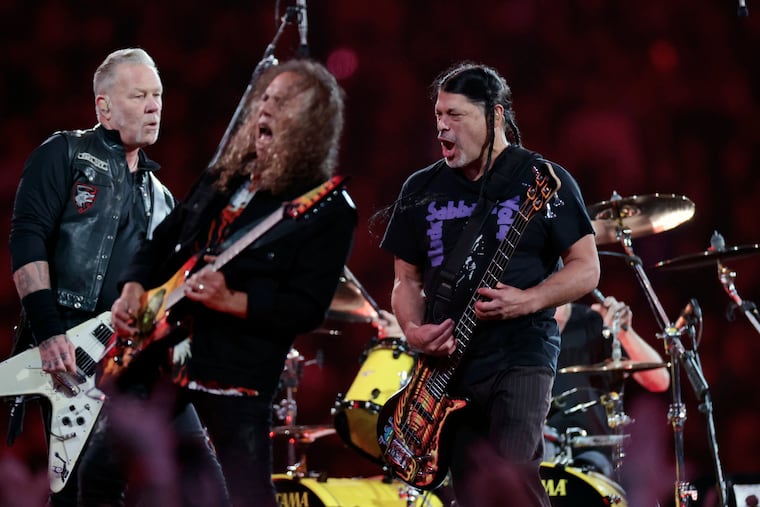 James Hetfield, Kirk Hammett, Robert Trujillo and Lars Ulrich (hidden) of Metallica on their M72 World Tour at Lincoln Financial Field in Philadelphia on Friday, May 23, 2025.