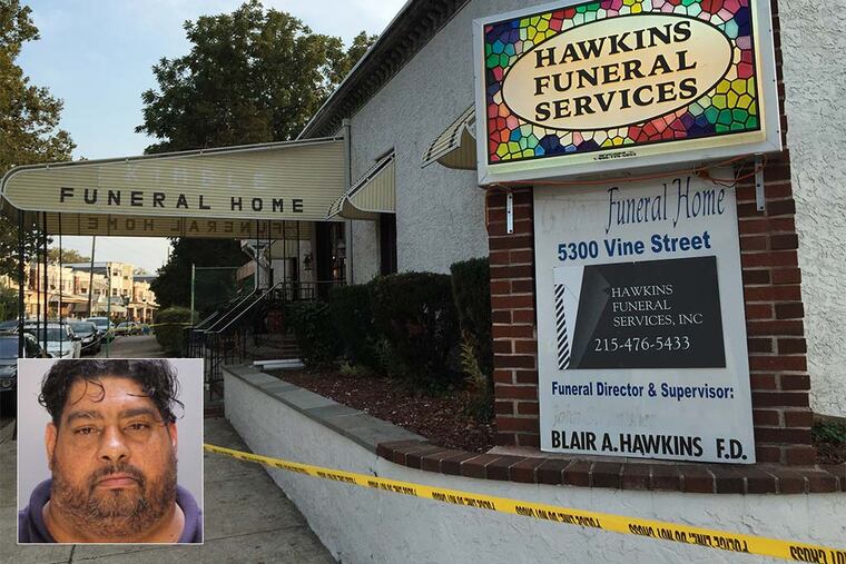 Blair Hawkins (inset), who allegedly had the funeral home since May 2014, was charged with three counts of abuse of corpse, according to police, who said Hawkins tried to bar the state inspector from entering. (Robert Moran/Inquirer Staff)