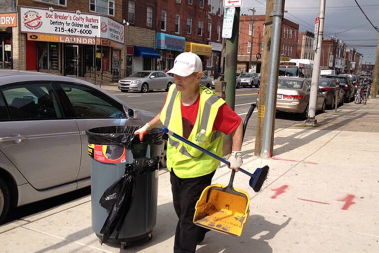 Newbold CDC cleaner Howard Weiss works his way down West Snyder Ave. (Michele Tranquilli / Daily News)