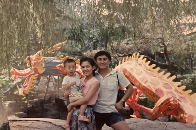 Leo Wang with his parents in the summer of 1991 at Daming Lake in Jinan, China.