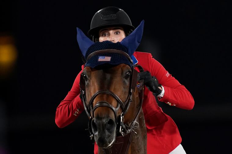 United States' Jessica Springsteen, riding Don Juan van de Donkhoeve, competes during the equestrian jumping team qualifying at Equestrian Park in Tokyo at the 2020 Summer Olympics, Friday, Aug. 6, 2021, in Tokyo, Japan. (AP Photo/Carolyn Kaster)