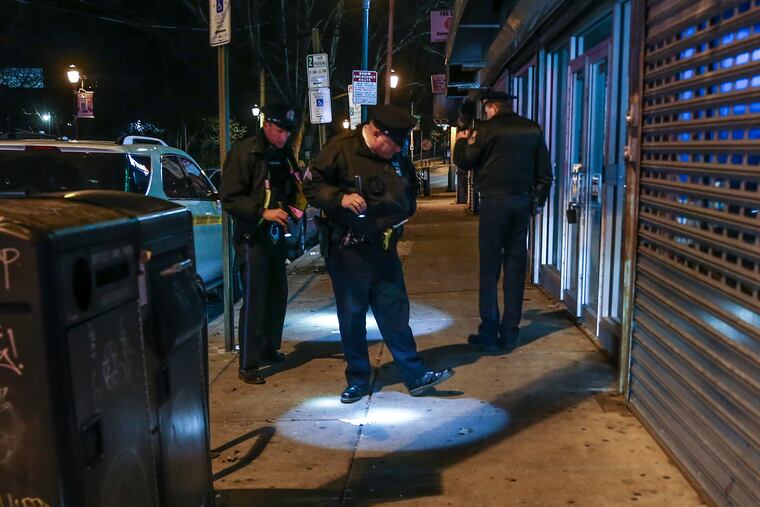 Police on the scene of a fatal shooting on Germantown Avenue. Thursday, March 3, 2022.
