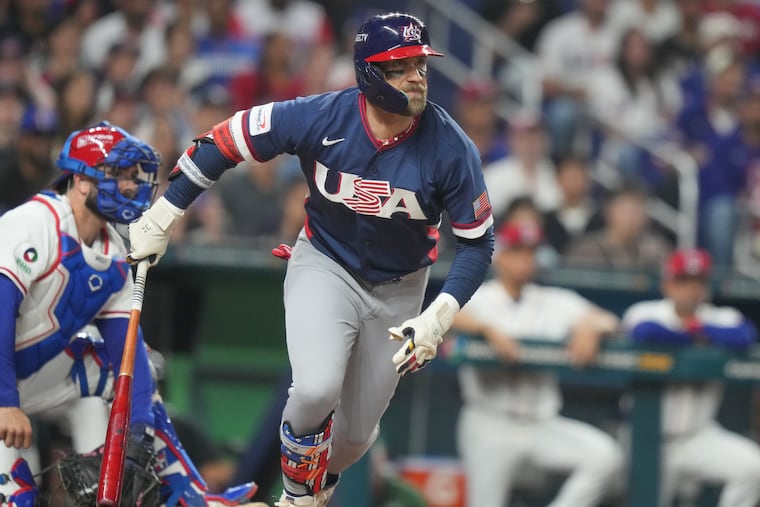 United States' Bryce Harper hits a double during the third inning of a World Baseball Classic semifinal game against the Dominican Republic, Sunday, March 15, 2026, in Miami. (AP Photo/Lynne Sladky)