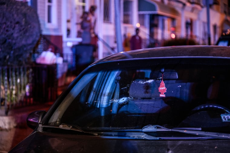 A Chevy parked on 56th Street was riddled with many bullet holes on Monday night.