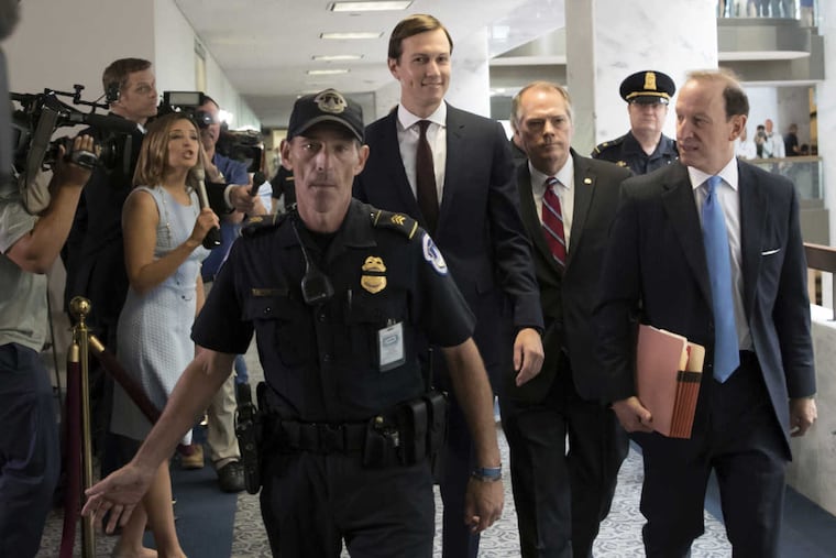 White House senior adviser Jared Kushner, accompanied by his attorney Abbe Lowell (right), arrives on Capitol Hill on Monday.