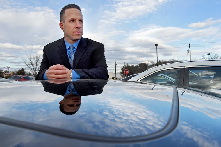 Former Washington Township police officer Joe DiBuonaventura poses in the parking lot of the Chick-Fil-A in Turnersville. It was there that a five-year legal battle began when he arrested NJ Assemblyman Paul Moriarty for DUI.