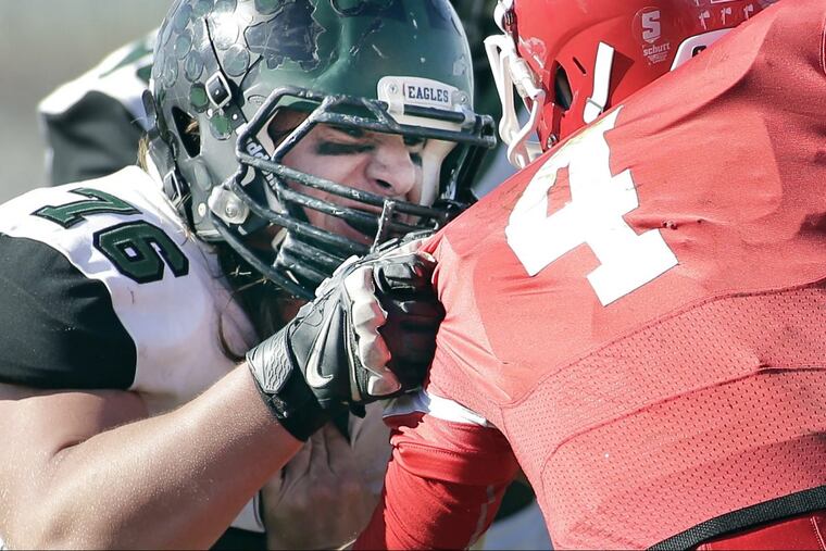 West Deptford’s Bob Metz sacks Paulsboro quarterback Colin McCarthy in the 3rd quarter of the annual Thanksgiving weekend game in 2017.