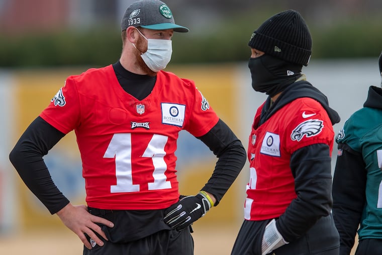 Jalen Hurts (right) will start over Carson Wentz against the Saints on Sunday. What does it mean for Wentz's future in Philadelphia? The Birds' Eye View crew debates.