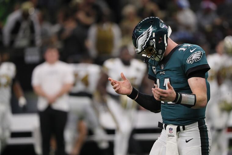Eagles Carson Wentz reacts after the Saints intercepted his pass late in the 4th quarter. Eagles lose 48-7 to the New Orleans Saints in New Orleans, LA on November 18, 2018. DAVID MAIALETTI / Staff Photographer