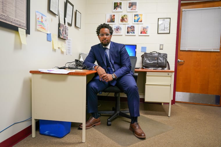 Rann Miller in his office at Camden Promise Charter School in Camden on Oct. 27, 2021. Miller is the head of diversity, equity, and inclusion for his Camden charter school district and is reshaping the curriculum to include important perspectives from the BIPOC community once left out.