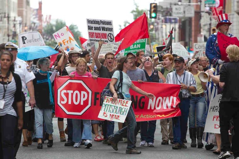 Anti-fracking protesters march at the 2011 Shale Insight conference in Philadelphia. Attendees at the 2020 conference, which was conducted virtually online because of the pandemic, were told that the shale gas industry faces an existential political threat from anti-fossil fuel activists.