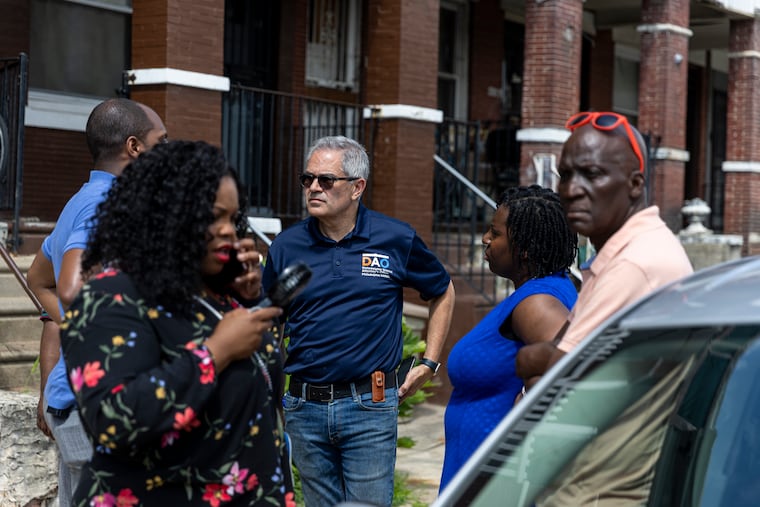 Philadelphia District Attorney Larry Krasner and State Rep. Joanna McClinton (center), along with Councilmember Katherine Gilmore Richardson (left) in the Kingsessing neighborhood after Monday night's mass shooting along 56th Street and Chester Avenue.