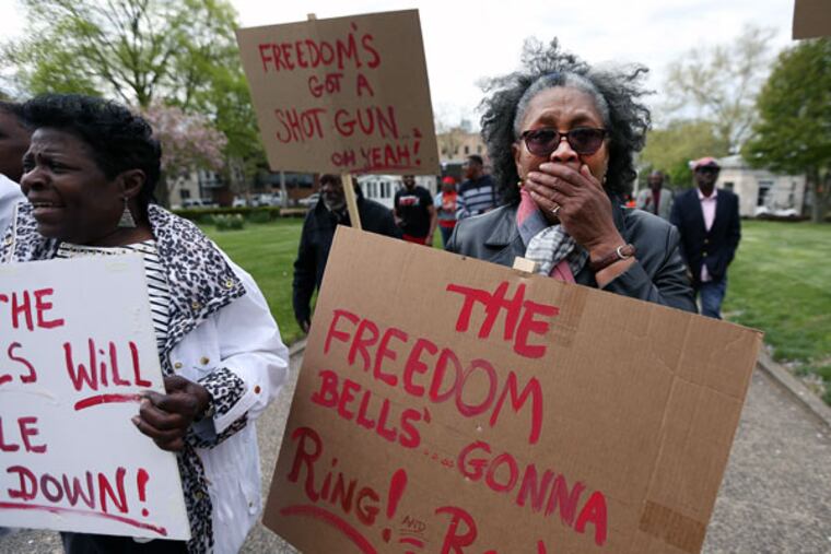 Bernyce Mills-DeVaughn cries as she enters the gates of Girard College in an event marking the 1965 protests to integrate the school. ( DAVID MAIALETTI / Staff Photographer )