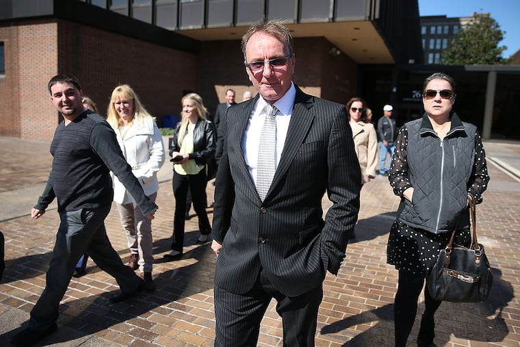 Former Philadelphia Traffic Court Judge Michael Sullivan leaves the federal courthouse in Philadelphia.