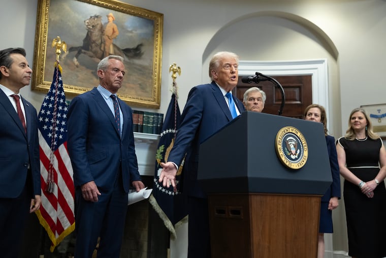 President Donald Trump, flanked by senior health officials, speaks during a news conference about autism in September. MUST CREDIT: Tom Brenner/For The Washington Post