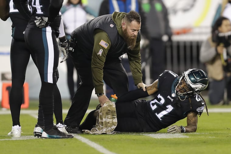 Eagles cornerback Ronald Darby lays on the field getting help with a third-quarter injury against the Dallas Cowboys on Sunday, November 11, 2018 in Philadelphia. YONG KIM / Staff Photographer