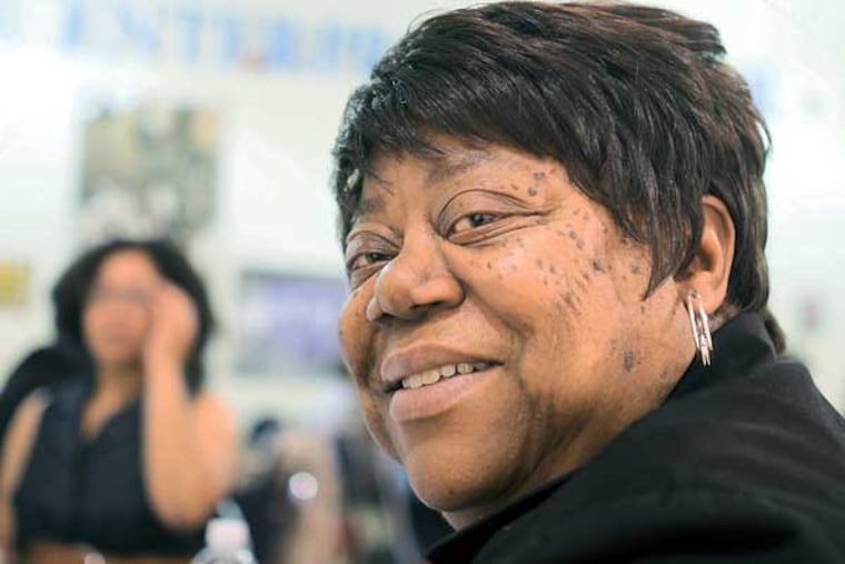 A diverse group of civic minded people made up of federal, state and local officials, financial wizards, educator, community organizers and just ordinary folks gathered at The Enterprise Center in West Philly as part of the Promise Zone initiative, a plan to fix Mantua, a broken neighborhood. Here, longtime Mantua resident Gwen Morris participates in the conference. (ED HILLE / Staff)