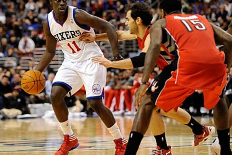 Sixers point guard Jrue Holiday finished with 14 points and six assists against the Raptors. (Michael Perez/AP)
