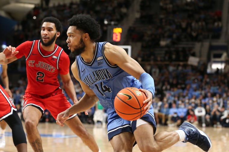 Villanova's Caleb Daniels driving against St. John's.